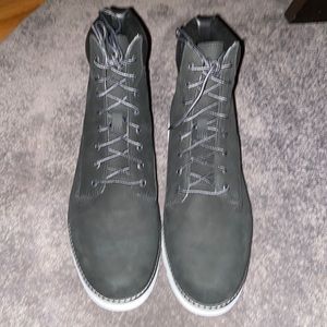 Stylish Black and White Timberland boots never worn before!